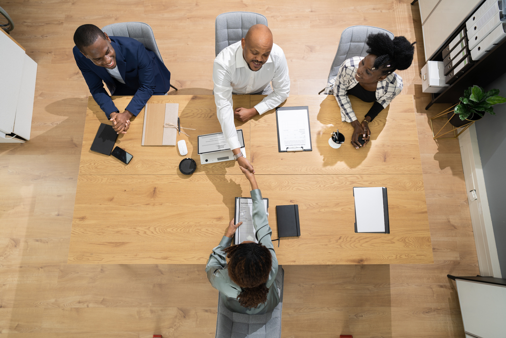 A project team collaborating around a table